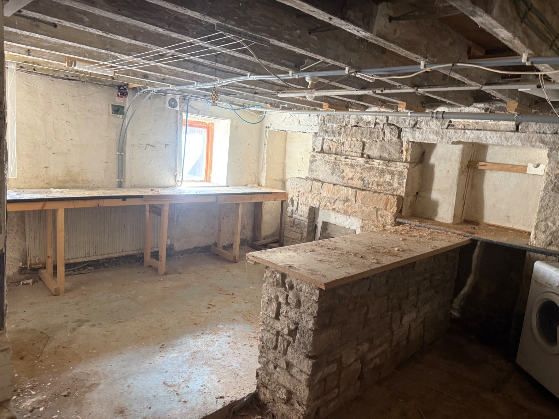 A cleared stone cellar after a full clearance